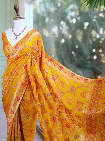 Solvara Yellow Bandhani Saree with Traditional Border