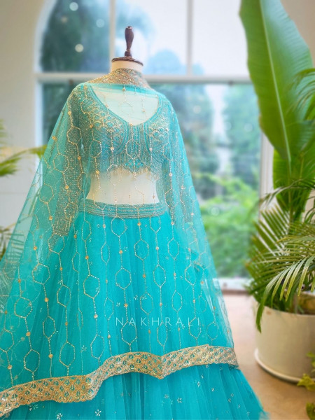 Lustre Enchant Blue Net Lehenga with Heavy Embroidered Blouse
