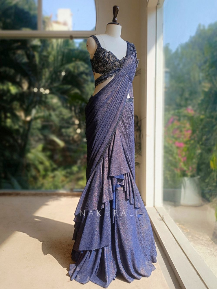 Image of Blue Zari Weaved Lycra Drape Saree with Embellished Blouse