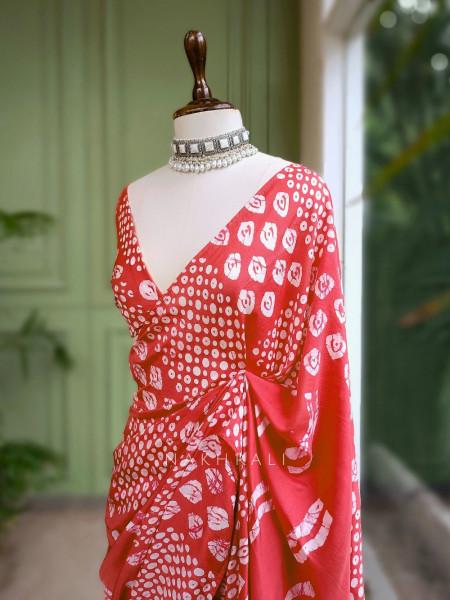 Varnika Rust Handloom Batik Saree with Tassels