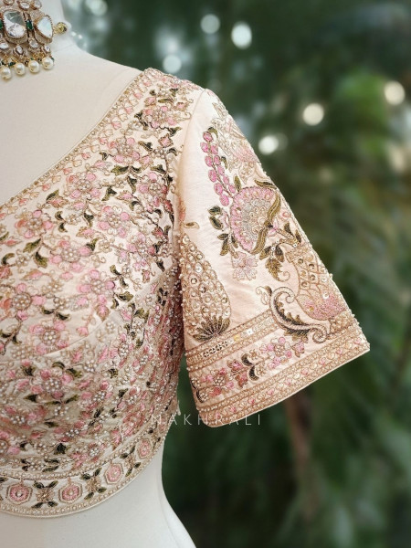 Padmavati Cream Bridal Lehenga with Beads and Embroidery