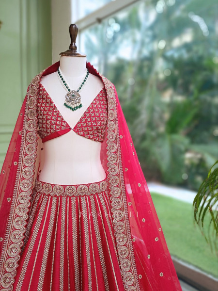 Vasundhira Red Unstitched Lehenga with Gota Patti and Zari Work