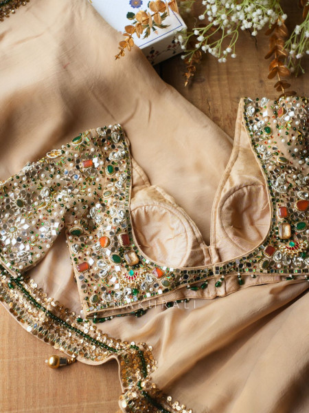 Noor-e-Kundan Brown Saree with Jewelled Blouse and Sequin Border