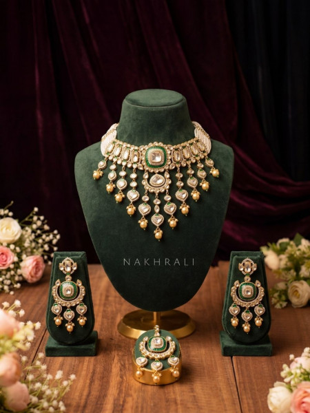 Chandrtaal  Green Kundan Necklace Set with Jhumka and Maangtika