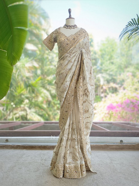 Kashvi Off White Saree with Readymade Blouse and Pearl Stone Work