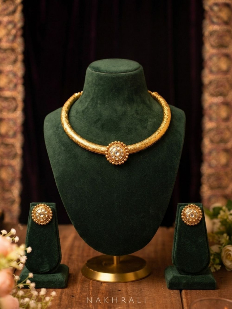 Image of Tanvya Golden Hasli Necklace Set with Stud Earrings