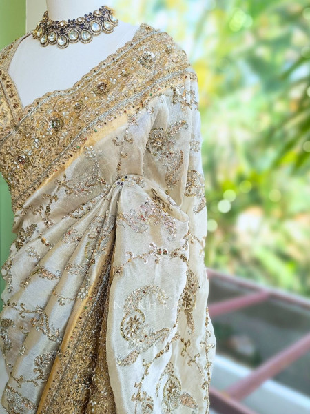 Kashvi Off White Saree with Readymade Blouse and Pearl Stone Work