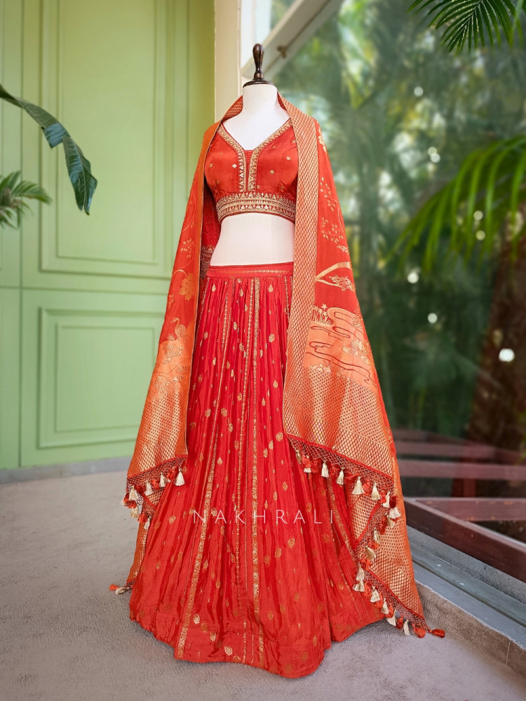 Image of Kavira Orange Lehenga with Woven Dupatta and Subtle Zari Work