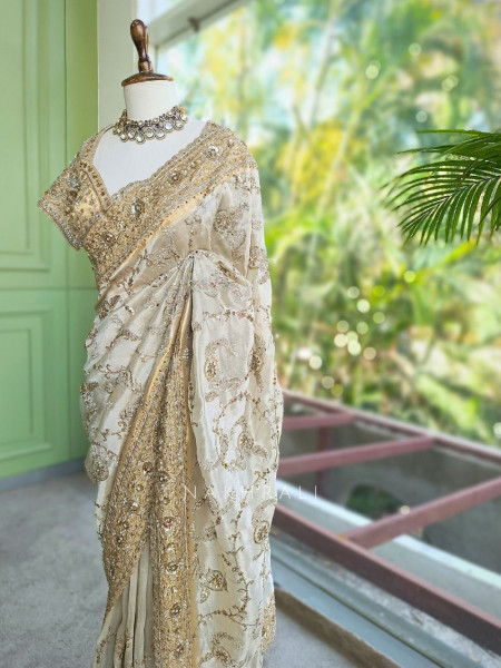 Kashvi Off White Saree with Readymade Blouse and Pearl Stone Work