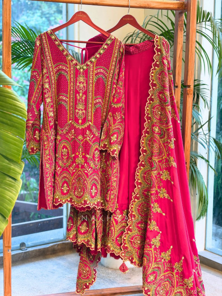 Tarini Magenta Palazzo Suit Set with Detailed Embroidery