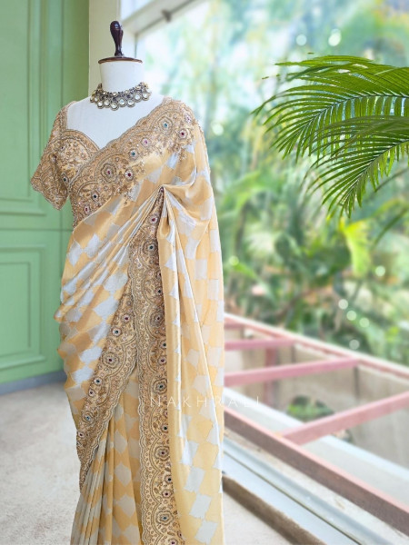 Avadhira Cream Saree with Cut Dana, Beads and Sequin Work