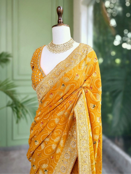 Navya Mustard Khaddi Georgette Bandhani Saree with Sequin & Cut Dana Work