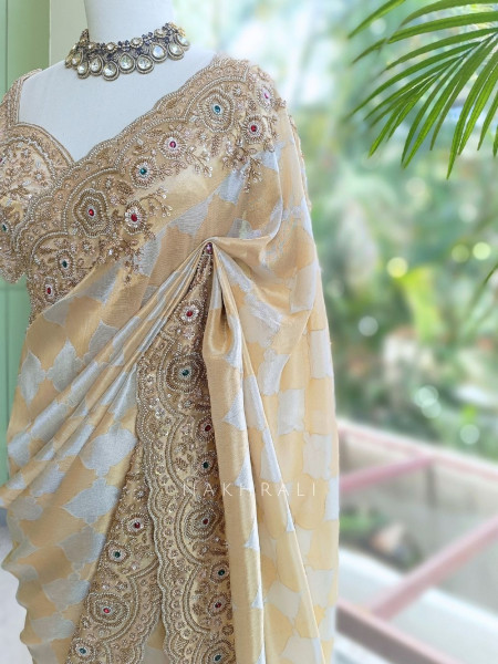Avadhira Cream Saree with Cut Dana, Beads and Sequin Work