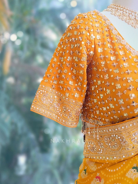 Navya Mustard Khaddi Georgette Bandhani Saree with Sequin & Cut Dana Work