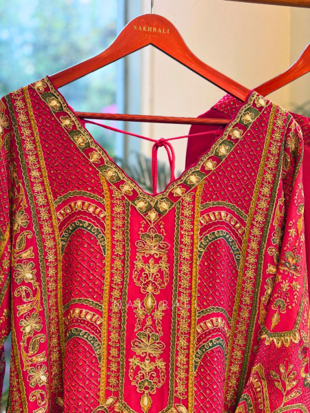 Tarini Magenta Palazzo Suit Set with Detailed Embroidery