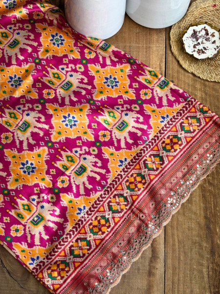 Aarini Magenta Patola Print Saree with Mirror Work Border