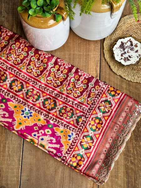 Aarini Magenta Patola Print Saree with Mirror Work Border