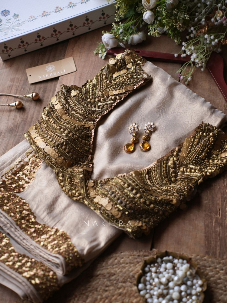 Image of Sunheri Elara Beige Satin Crepe Saree with Statement Blouse &amp; Pitta &amp; Antique Gold Coin Work
