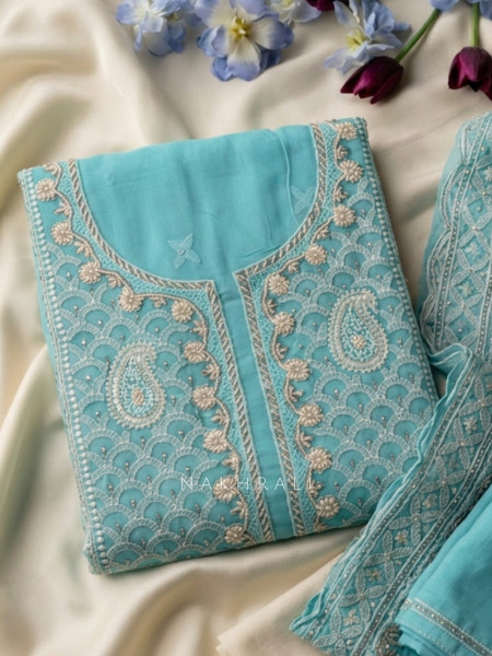 Mridula Blue Dress Material With Embroidered Neckline and Border Detail