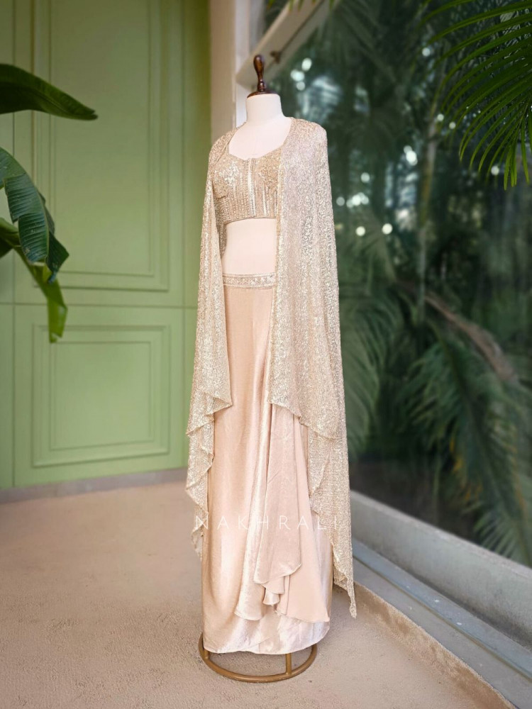 Image of Roséveil Beige Corset Skirt Set with Sequin Work and Cape Shrug