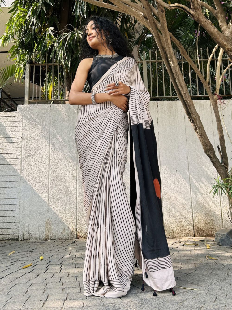 Image of Divya Cream Modal Stripe Printed Saree Collection