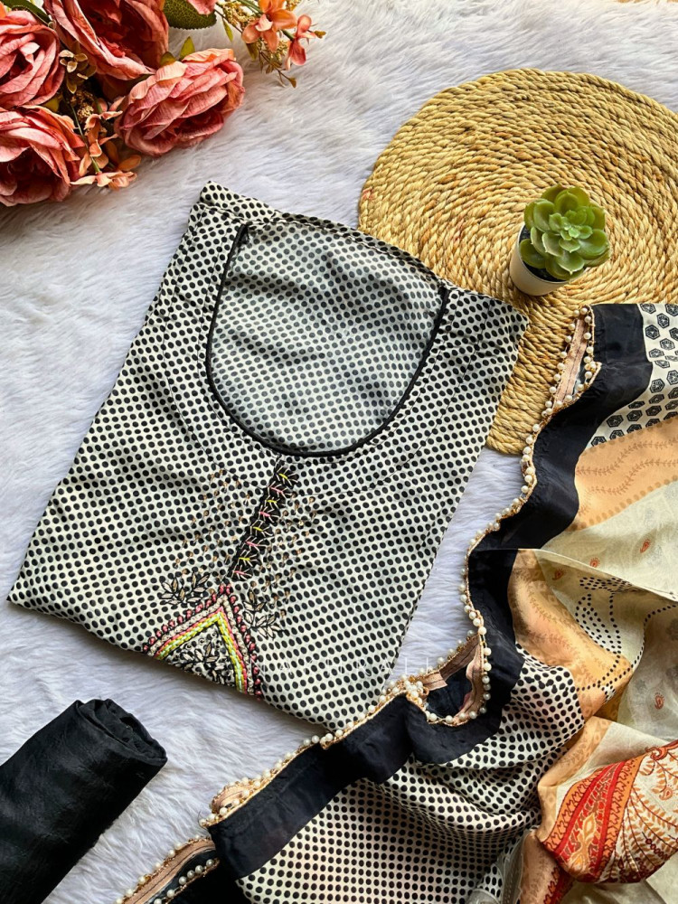 Image of Nivara Black Printed Dress Material Set