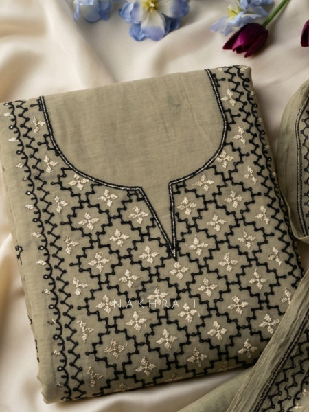 Karigari Green Dress Material With Contrast Embroidery and Border Detail