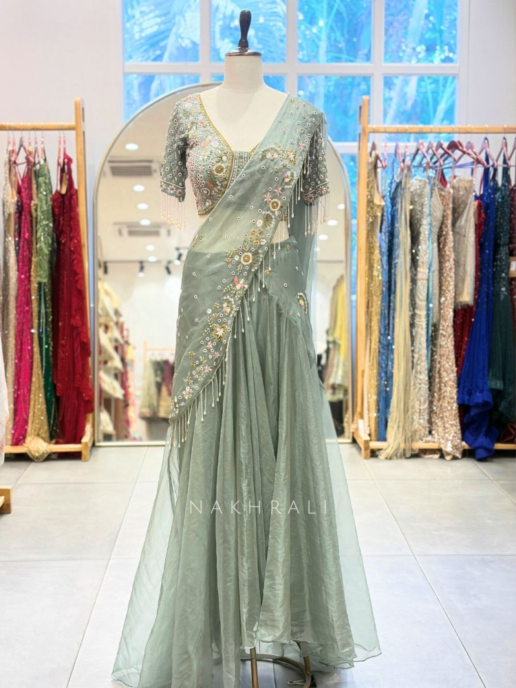 Image of Madhavi Sea Green Crop Top Skirt Set With Floral Embroidery