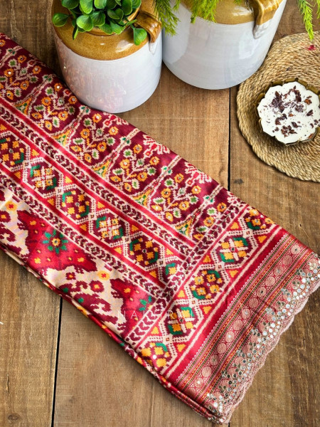 Aarini Maroon Patola Print Saree with Mirror Work Border