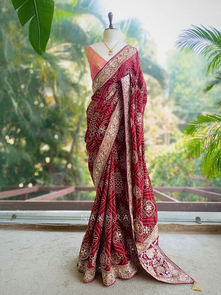 Image of Rivaya Maroon Bandhej Saree With Runing Blouse