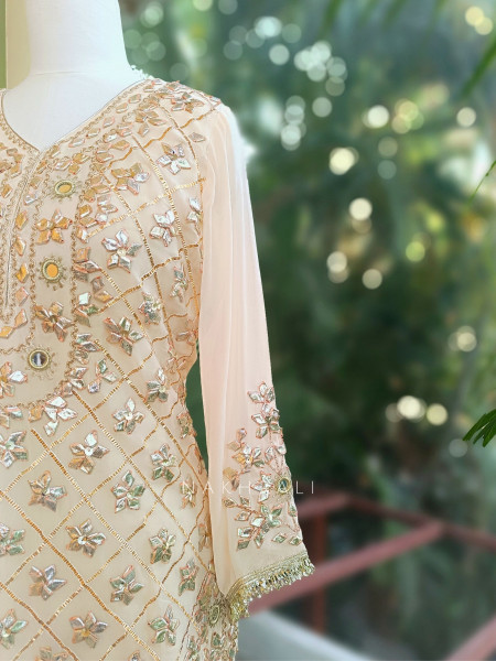 Nivora Cream Suit Set with Gota Mirror Work