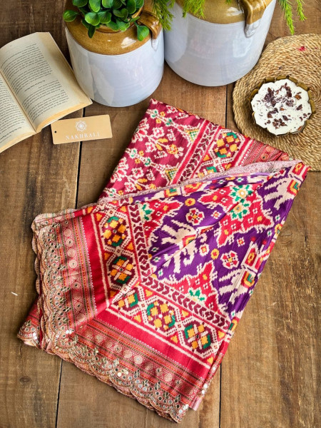 Aarini Purple Patola Print Saree with Mirror Work Border