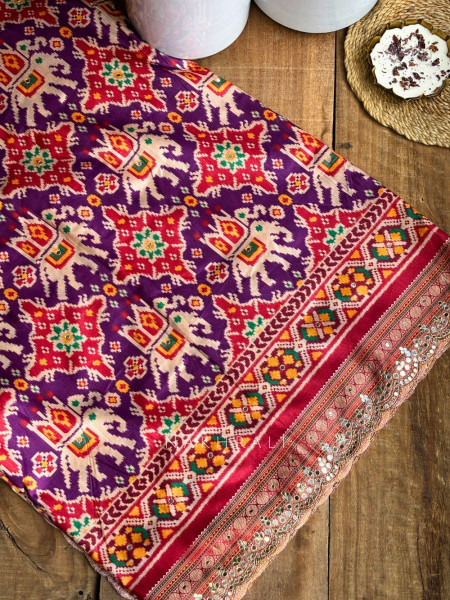 Aarini Purple Patola Print Saree with Mirror Work Border