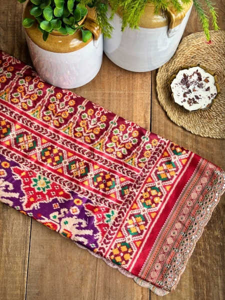 Aarini Purple Patola Print Saree with Mirror Work Border