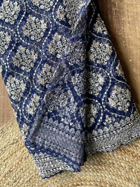 Tarangini Blue Net Saree With Cutdana and Sequin Work