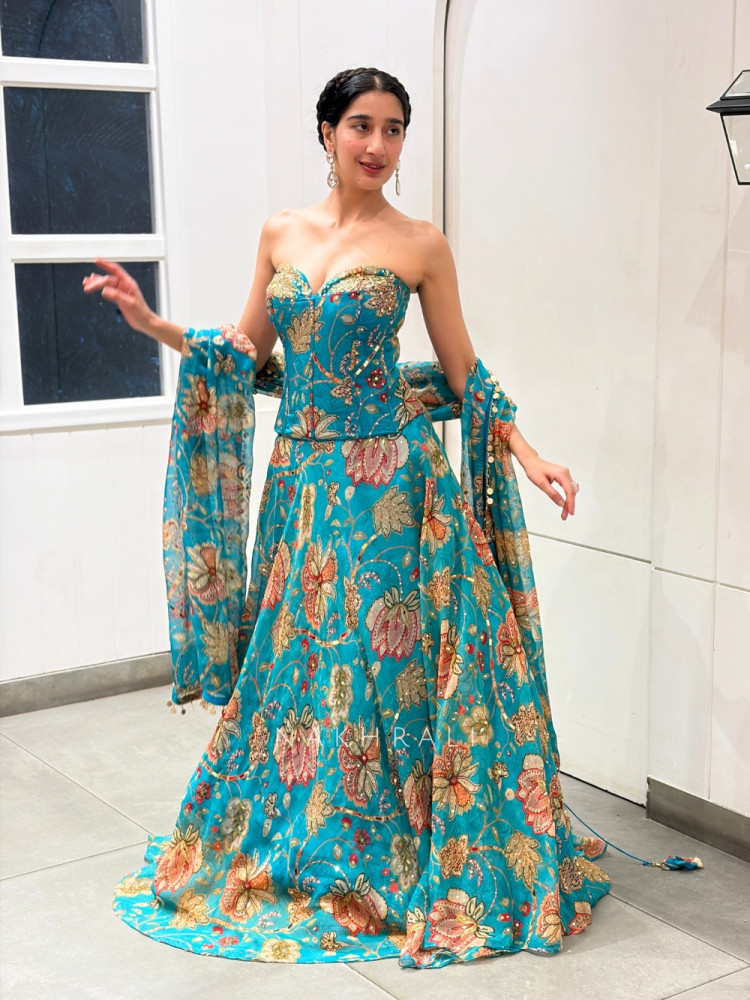 Image of Nakkashi Blue Organza Silk Floral Printed Corset Lehenga Set with Zardozi &amp; Mirror Work