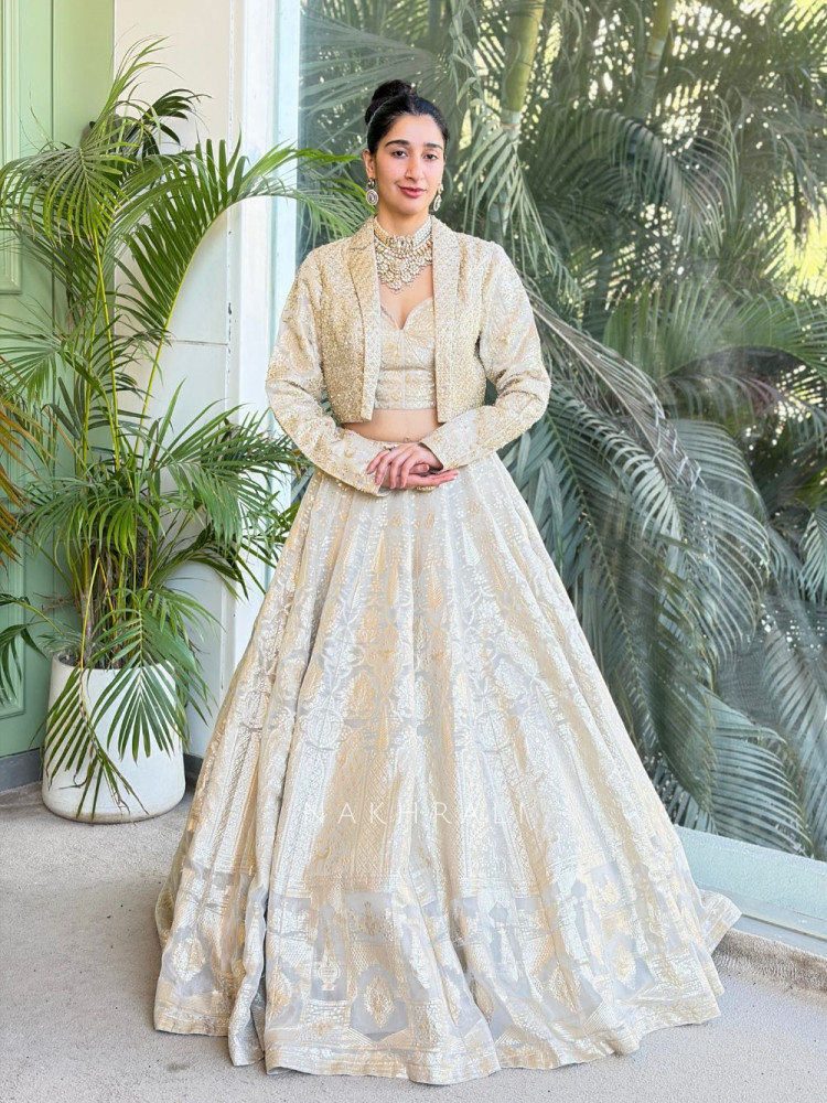 Image of Eloria Cream Banarasi Indo-Western Lehenga Set with Stone Work