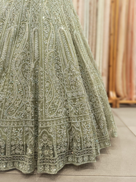 Venoora Green Bridal Lehenga with Zari and Sequin Work