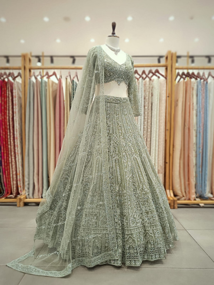 Image of Venoora Green Bridal Lehenga with Zari and Sequin Work