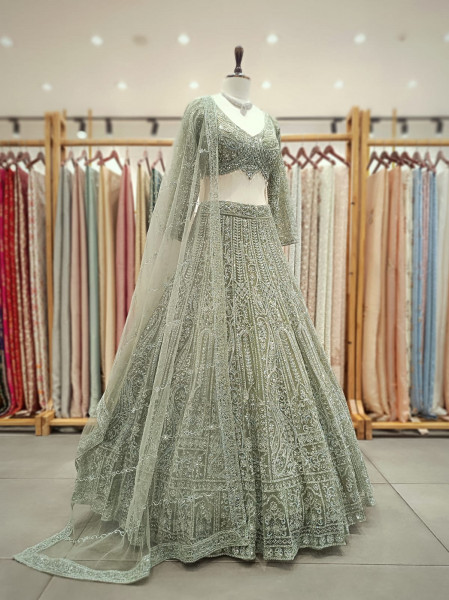 Venoora Green Bridal Lehenga with Zari and Sequin Work