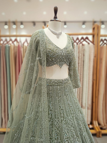 Venoora Green Bridal Lehenga with Zari and Sequin Work