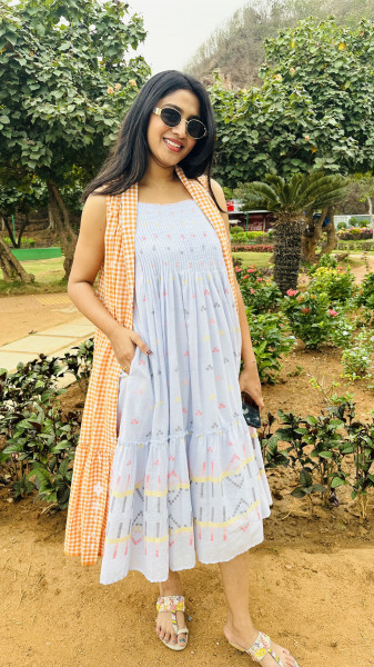 Pure Mul Cotton Jamdani dress with3/4 sleeves paired with checkered jacket with crochet patch