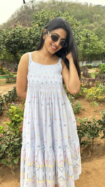 Pure Mul Cotton Jamdani dress with3/4 sleeves paired with checkered jacket with crochet patch