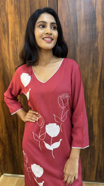 Soft cotton kurta with appliqué and thread work paired with pants