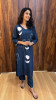Soft cotton kurta with appliqué and thread work paired with pants