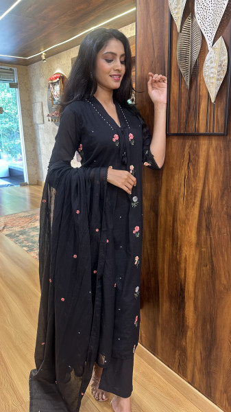 Mul cotton fully embroidered kurta paired with straight pants and dupatta