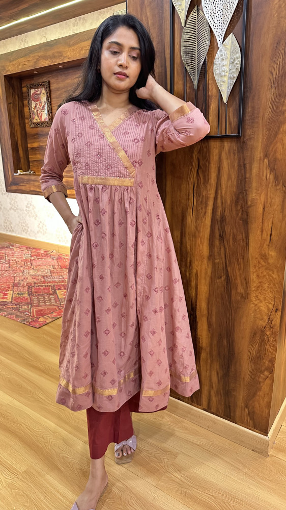 Image of Mangalgiri cotton flared kurta Paired with straight pants