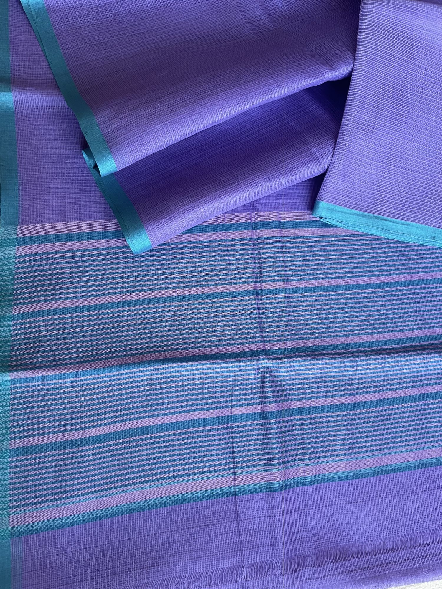 Kota Doria cotton-silk handloom saree with raw silk Ikat blouse fabric