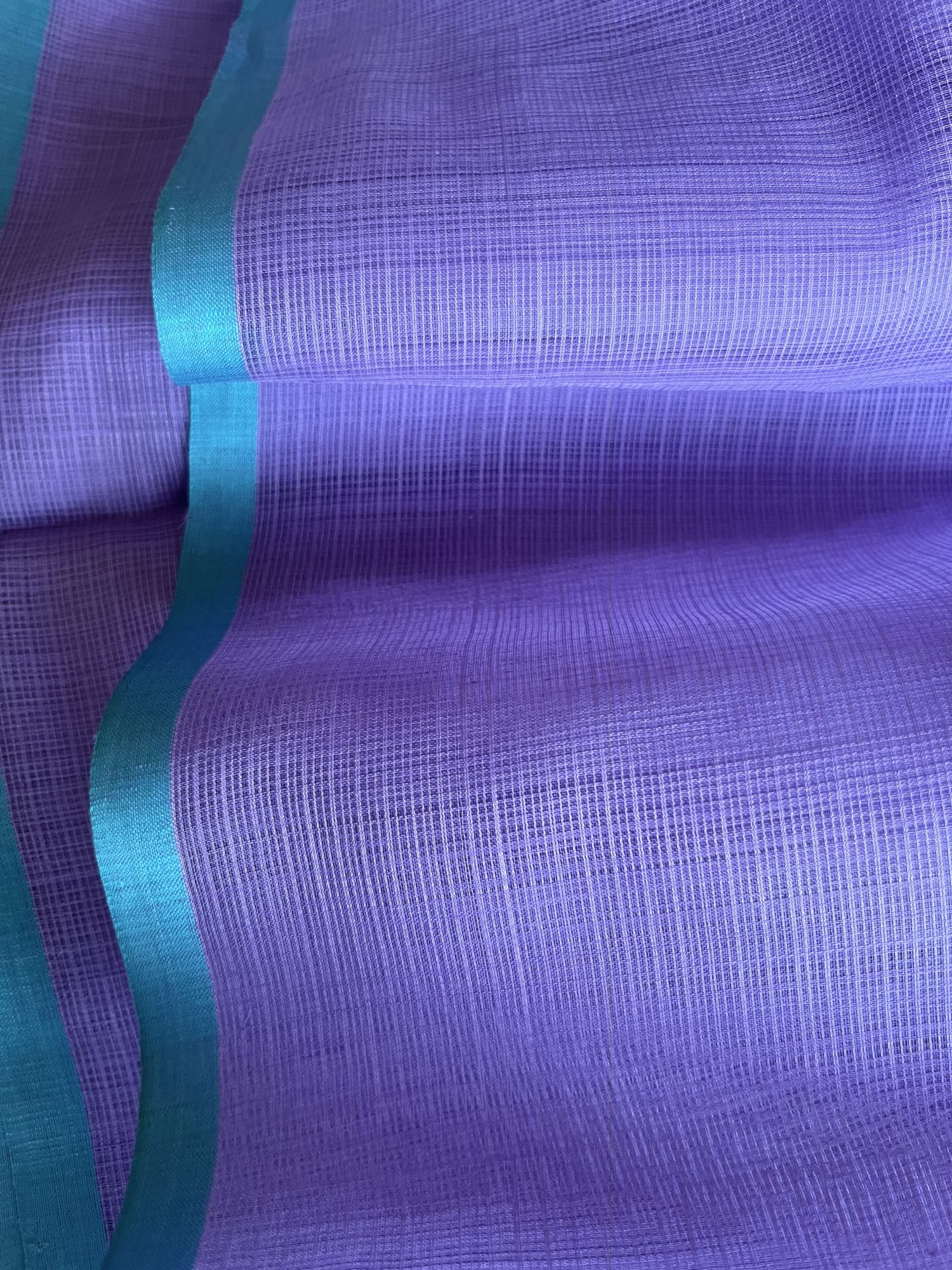 Kota Doria cotton-silk handloom saree with raw silk Ikat blouse fabric