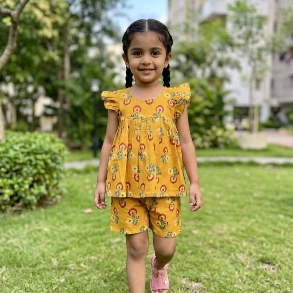 Image of Mustard Yellow Floral Frock-Style Top and Shorts